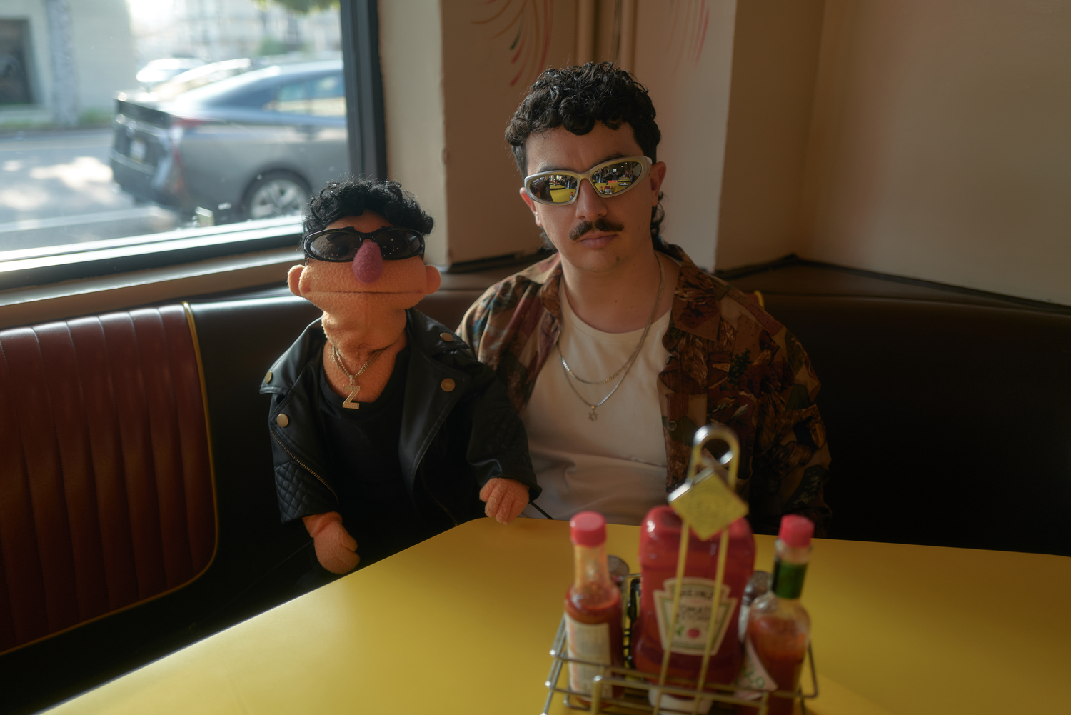 LMNOP and LIL Z in a diner